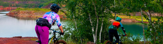mountain biking swimming redhead